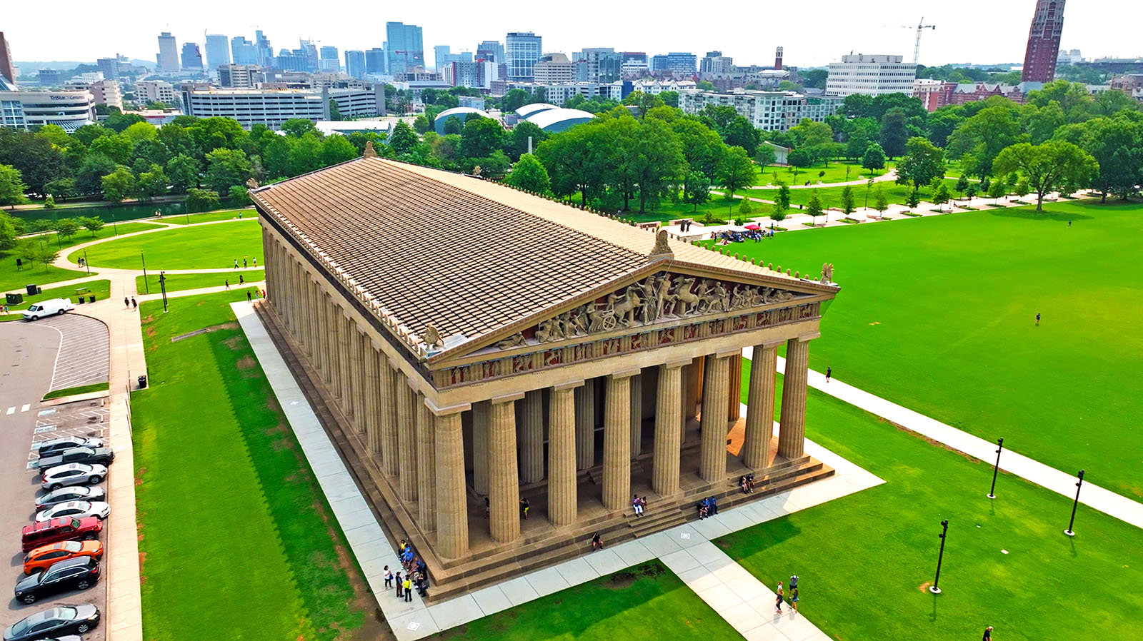 Areal view looking down on the Parthenon in Centennial Park in Nashville, showing the parking lot and green space